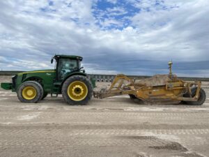 Tractor and scraper contractor